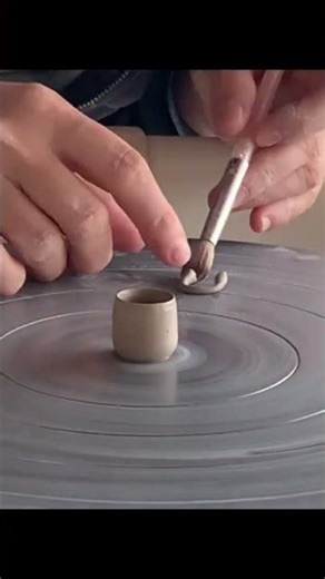 Throwing a miniature mug on pottery-wheel #art #clay #craft #shorts