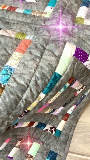 Patchwork quilt sewn from small scraps of fabric
