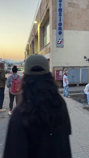 Urban Street Filming with Diverse Attire and Crew