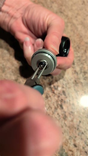 Tightening the LED module holder on the Dr. Mom Otoscope