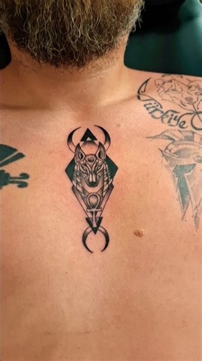 ​Geometric Anubis Sternum Tattoo | Alex Tattoo Hurghada