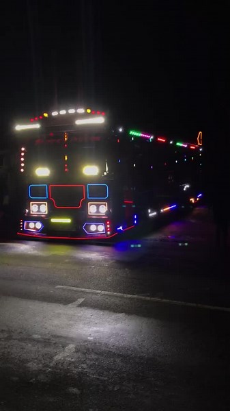 Vibrant LED Bus Showcasing Nighttime Spectacle