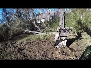 Excavator Clearing The House Lot