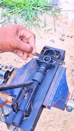 Manufacturing or assembling spring components on metal mounts using a vise #shorts