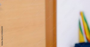 Man hides TV remote in his pants pocket. Beginning of school year ban on watching TV, time limit. Raising children punishment for wrongdoing. strict dad with tv remote doesnt let kids watch tv