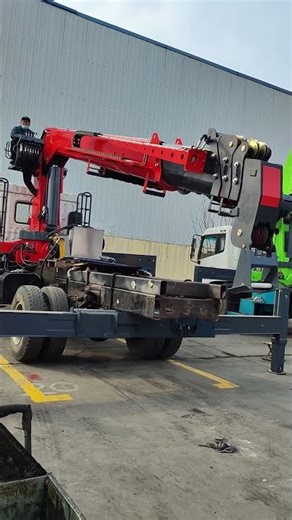 8-ton truck-mounted crane with drilling unit, multi-functional machine. Capable of lifting, towing,