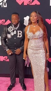 142K views · 10K reactions | #fashionbombcouple @yogotti and @angelasimmons attended the #mtvvmas , with #angelasimmons in a custom look and #yogotti in a $4,892 @balmain baseball jacket. Hot! Or Hmm..? Grab #yogotti ‘s jacket at the link in our bio! #angelasimmonsfbd #fashionbombmen #mensfashion #mensstyle | Fashion Bomb Daily | Facebook