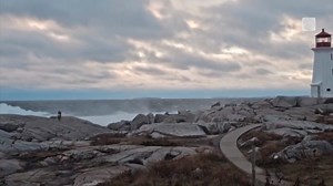 Strong wind, overcast skies in majestic Peggy's Cove, Nova Scotia