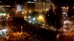 Athens, Greece: Aerial view of the massive solidarity protest with hunger striking, anarchist prisoner Nikos Romanos. 15,000 or more in a massive demonstration of solidarity with hunger striking prisoner & anarchist Nikos Romanos Solidarity rallies happened in several Greek cities: Thessaloniki, Patras and Chania. Twenty days ago anarchist prisoner Nikos Romanos went on hunger strike to demand his educational furlough. His situation is described as ‘critical’. http://roarmag.org/2014/12/hunger-s