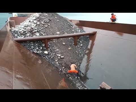 Barge unloading 3300 tons large and small cobblestone - relaxing video