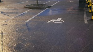Inclusive parking space: Handicapped or disabled sign marked on the asphalt, ensuring accessibility for all drivers