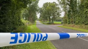 Police at the scene in Maguiresbridge this afternoon following a fatal shooting incident, where two people have died and two others are seriously injured in hospital. | Belfast Live