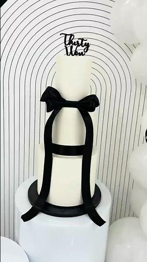 This mini 3 tier bow cake was so fun to create!