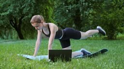 Athletic sportswoman doing workout burning fat calories doing fitness...