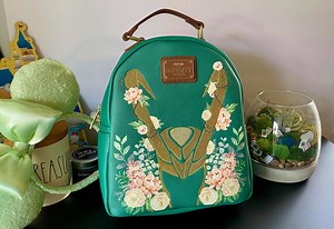 The New Floral Loki Loungefly Bag Is Burdened With Glorious Purpose | Chip and Company