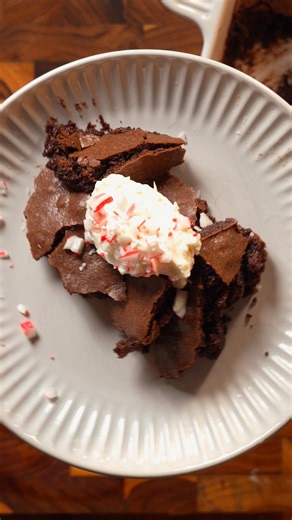Tasty on Instagram: "Ina Garten's brownie pudding has been all over our feeds. @mymanabites puts a fun twist on this recipe with peppermint! 🍫 The perfect holiday dessert, best served with a tall glass of milk or ice cream. Find the full recipe on Tasty.co"