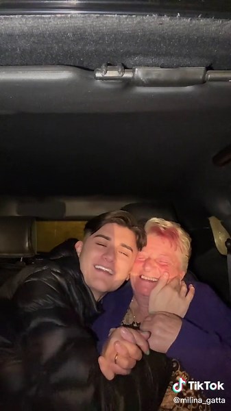 Affectionate Moments Inside the Car at Night