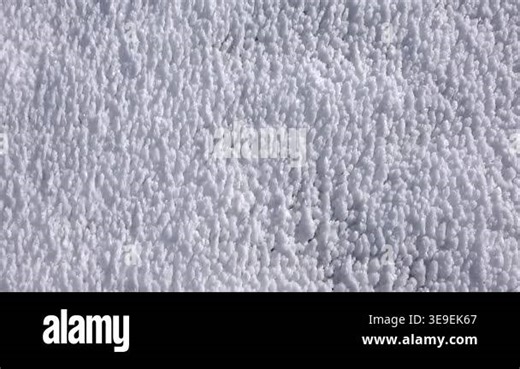 Crystal hoarfrost rime layer accumulated on a cold winter surface, serene and beautiful. Humid air freezes into sharp ice formations, creating natural frost texture, calm soothing. frozen, cold rime, ice crystal, cold surface Stock Video Footage - Alamy