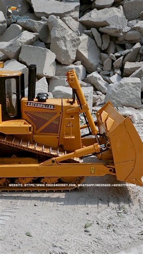 104K views · 2.7K reactions | Just saw something MIND-BLOWING — a 1:14 hydraulic bulldozer taking on a GIANT rock! Hydraulic power is just INSANE — crazy strength + pinpoint control! Work efficiency? MAXED OUT. Hills, construction sites, rough ground… no big deal. It plows through everything like it’s NOTHING. Tap in to watch PURE DOMINATION in action! #HeavyMachinery #Bulldozer #HydraulicPower #ConstructionLife | Toucanhobby RC Model | Facebook
