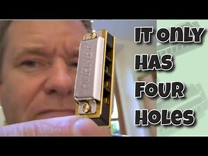 Is this a toy? 4 Hole Hohner Harmonica.