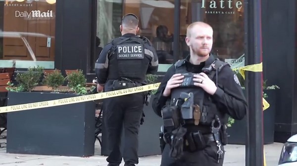 Authorities swarm the scene of shooting in DC near the White House
