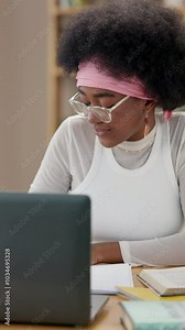Student, laptop and writing with black woman in home office for research assignment, college thesis and online portal. Education, knowledge and elearning with girl for university, school and project