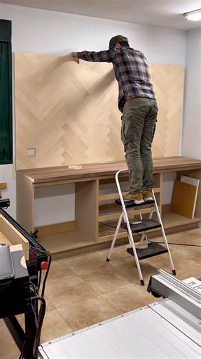 Template for making a precise cut in a wall cladding board.