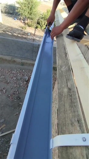 The Seamless Gutter Connection #POVskills #GutterInstallation #RoofingPro #ConstructionSkills #diy