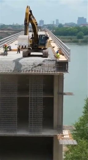 Excavator Trapped as an Unfinished Bridge Fails Without Warning