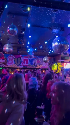 Bunga 90 on Instagram: "It’s the final countdown to the year 2000 and the world’s about to reboot! Step inside the brand new Bunga 90 in Covent Garden, London’s most interactive 90s-themed cocktail, pizza & karaoke bar, for a night of pure nostalgia, outrageous fun, and glittering Y2K energy. Standing tickets remaining, grab yours now 🔗 🪩💫🥂"