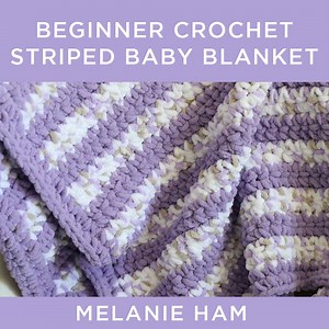 This crochet blanket makes the perfect baby shower gift! Step-by-step instructions: http://bit.ly/AmpMHBaby | Kin
