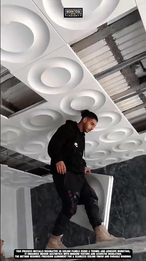 Installing 3D ceiling panels indoor modern design worktool trowel