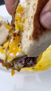 The perfect breakfast sandwich. Pork Scrapple, Egg, Bacon and bourbon barrel aged maple syrup. #breakfast #LancasterPA #scrapple #hookedonbbq | Hooked on BBQ