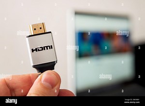HDMI line connecting the audio and video system of notebook to projectoror TV. 4K high-speed signal transmission. High quality signal cable for profes Stock Photo - Alamy