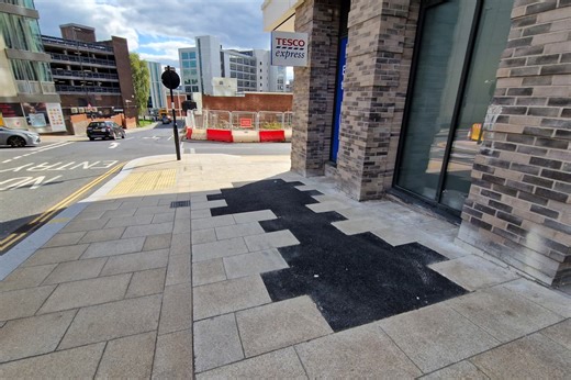 Utility firm responsible for asphalt patches on newly-laid pavement