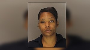 Woman caught smoking pot with two children in the car outside an elementary school