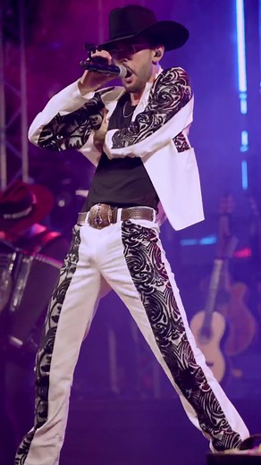 Live Concert Performance with Unique Cowboy Outfit