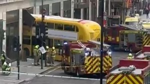 A double-decker bus smashed through a pub window near Tottenham Court Road Tube station in central London on Tuesday morning.
