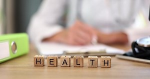 clip-1097014447-doctor-writes-information-about-patient-check-sheet