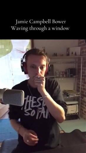 Jamie Campbell Bower Singing Waving Through a Window