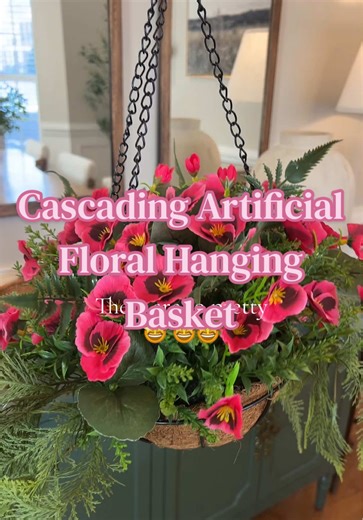 This cascading artificial floral hanging basket is so pretty! These are a little smaller than the classic hanging basket and adds a beautiful pop of color to your entryway, home decor, and/or outdoor living space. ##flowers##floral##hangingbasket##outdoordecor##tiktokshopcreatorpicks@@QVC, Inc