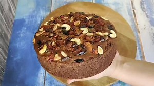 159K views · 2K reactions | Eggless Christmas Plum Cake Recipe/ No Alcohol #plumcake #christmasplumcake #egglesscakes Ingredients: Dryfruits 200g Orange Juice 200ml Sugar 1/4 cup Butter 2 tsp Hot Water 1/4 cup Refined oil 1/4 cup Powder sugar 3/4 cup Curd 1/2 cup All purpose flour 2 1/4 cup Mix masala powder (Clove, ginger dal, chini, jayfal )- 1-2 tsp Cocoa powder 2 tsp Baking powder 3 tsp Baking soda 3/4 tsp Salt 1/4 tsp Vanilla essence 1 tsp | Baked Bliss by Shilpi | Facebook
