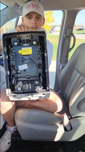 How to Remove the Center Console from a 2013 Chrysler Town and Country.