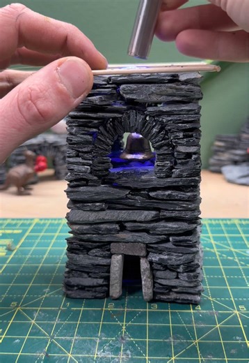 Making the bell for the tower… It was made from polymer clay but I didn’t show it as it was a long messy process. A simple bell was a lot harder than you’d think to sculpt 😂 but happy with the result. It’s painted with metallic gold paint which I’m really happy with but it needs some rust! Will paint again soon. It’s hung from the frame of the roof which allows it to move freely. The roof is in progress and will be made from about 100 hand-made clay tiles. Follow the page to see the journey! #t