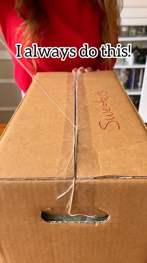 Jeff & Lauren on Instagram: "📦 Add string down the center of packing tape to make an easy open storage box! #storage #StorageSolutions #organization #organizedhome #hometips"