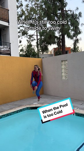 Swimming in a Spider-Woman Suit at the Pool