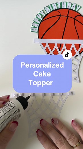 🏀 Make this custom basketball cake topper with me! Do you have an NBA team where you live? We have the Toronto Raptors here. 🏀 #caketopper #basketballcake #basketballbirthday #caketoppertutorial #cricutmakerprojects #creativefabricasvg #papercraftersoftiktok #ugccontent #learnontiktok