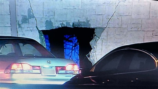 Deadly crash shuts down I-55 in suburbs as car goes airborne, breaks through wall and lands on interstate