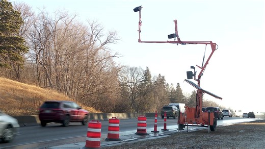 AI traffic cameras track drivers using cell phones