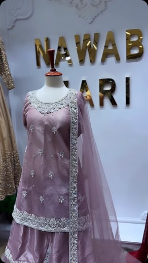 “✨ Elevate your style with our exquisite hand-made zari work Sharara, now available in stunning Lavender and classic White. Stitched to perfection with a luxurious tissue lining, this piece is all about elegance and grace. Priced at just 15,000 PKR, it’s the statement outfit your wardrobe needs! Don’t miss out on this masterpiece—shop now and shine bright! ✨ #EthnicElegance #ZariMagic #LuxuryFashion” | Nawab Zari House